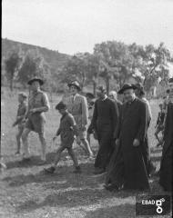 Monsignor Moscato Demetrio con sacerdote e boy-scout